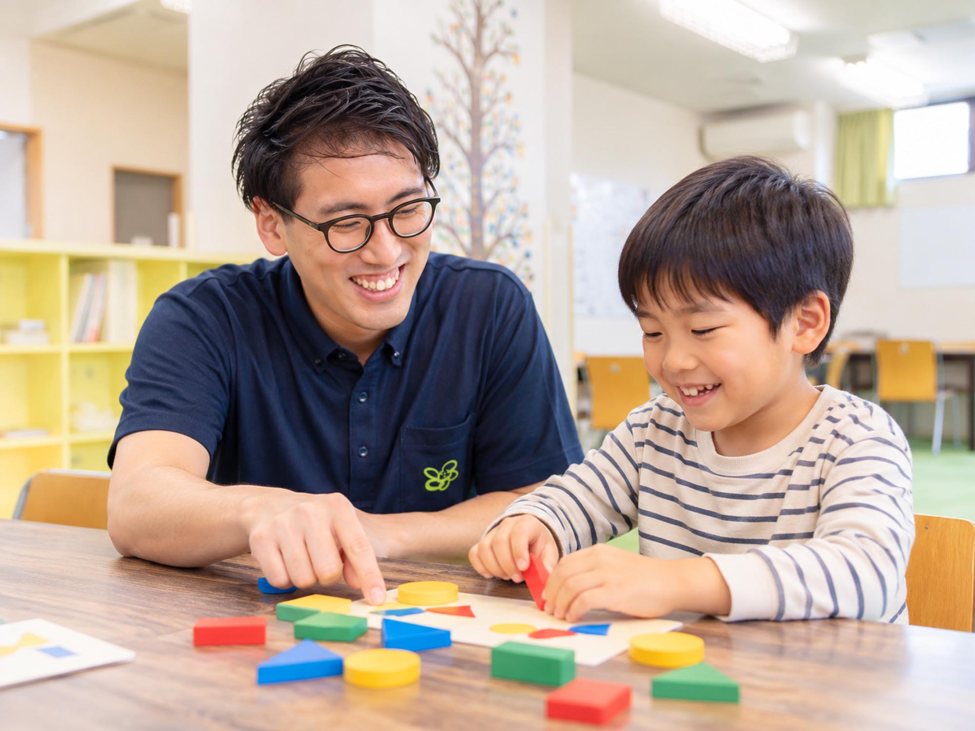 子どものそばで一緒に活動する北ミナのスタッフ